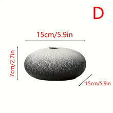 مزهرية سيراميك باللونين الأبيض والأسود