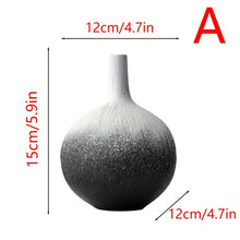 مزهرية سيراميك باللونين الأبيض والأسود